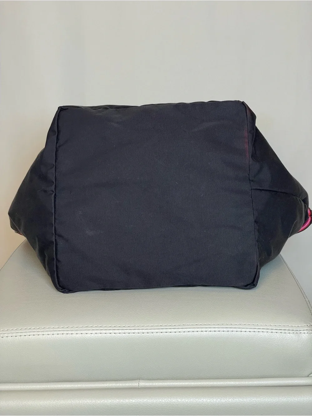 kate spade black tote with pink and red trim